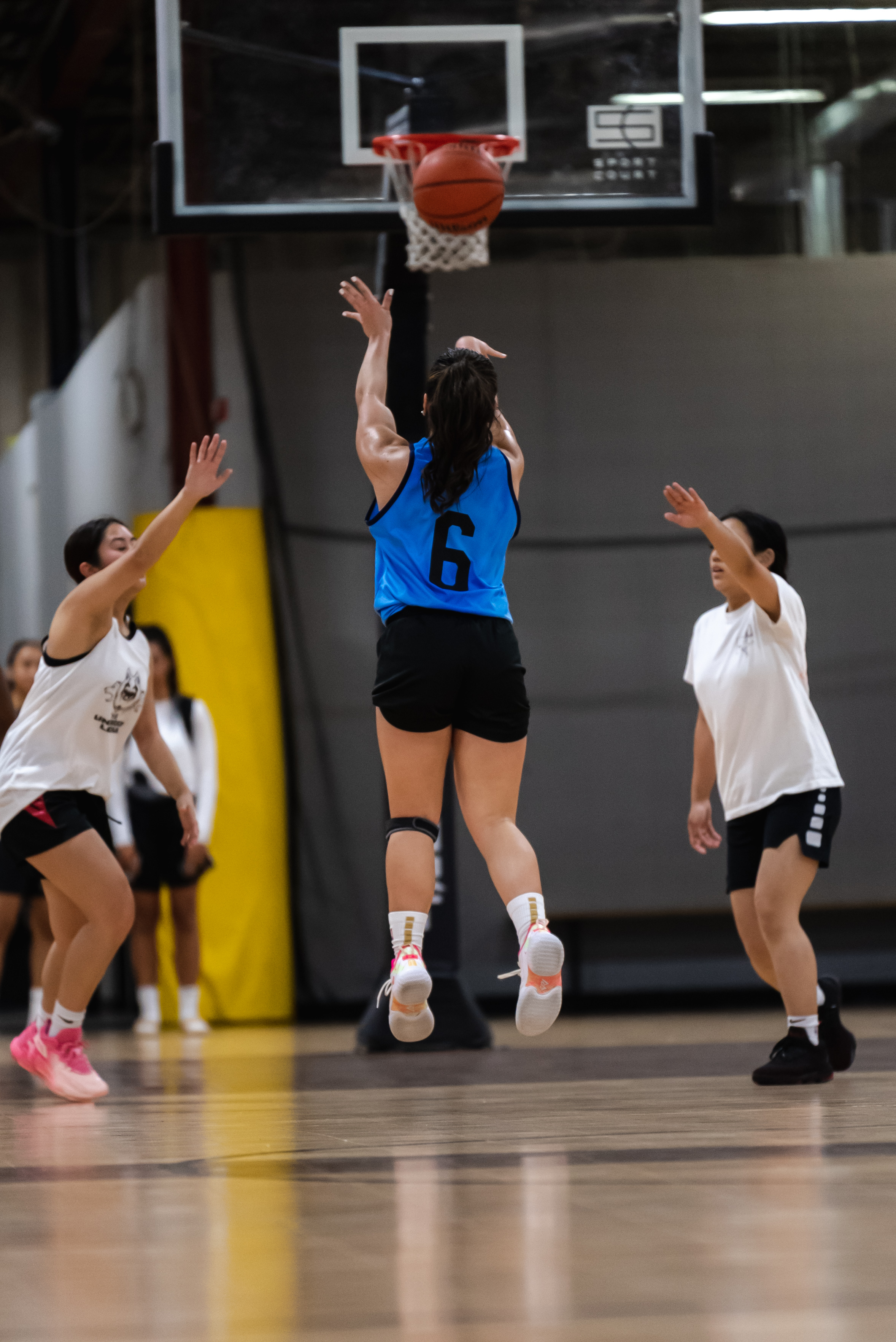 Jan shooting a basketball