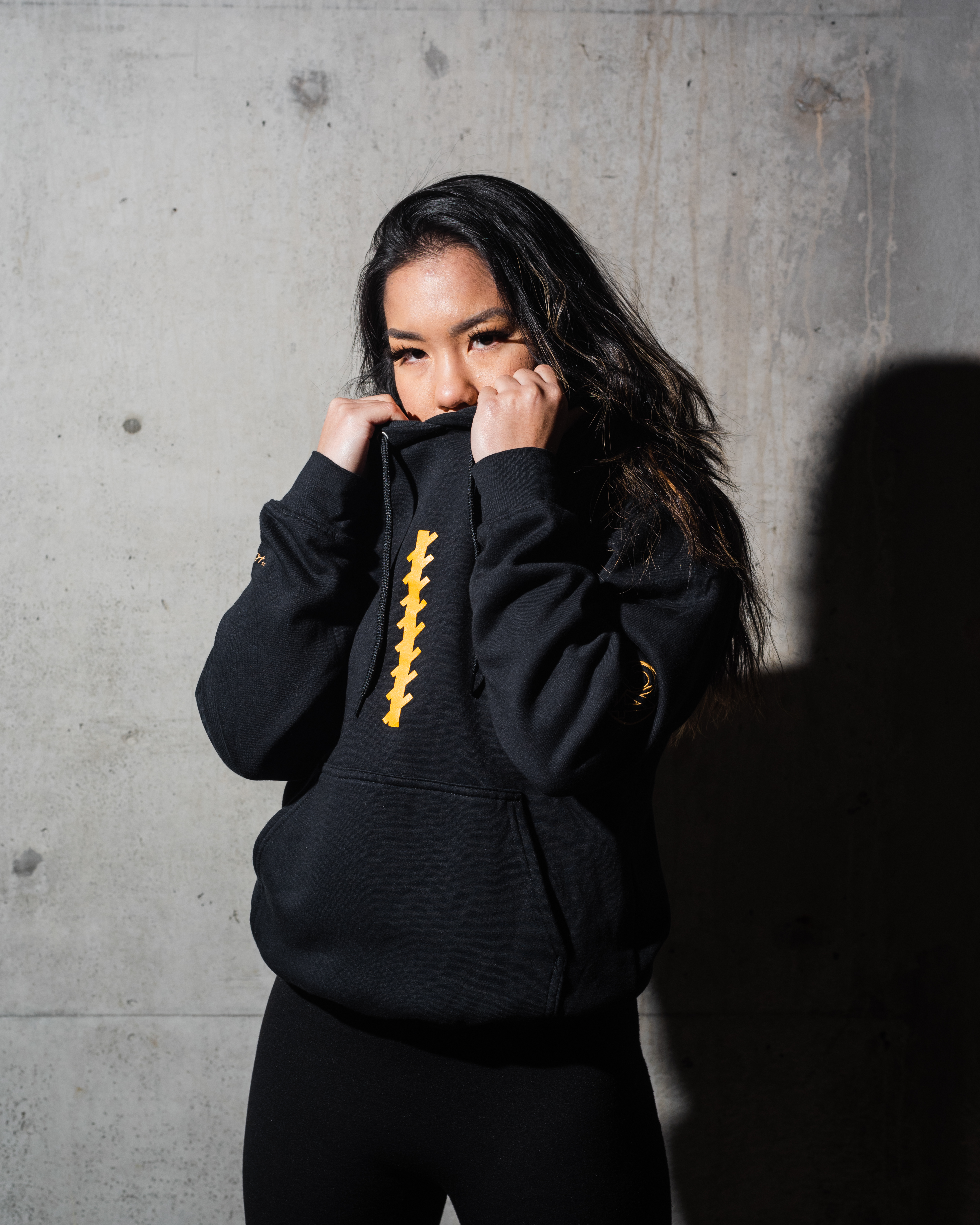 Jan pulling up sweater