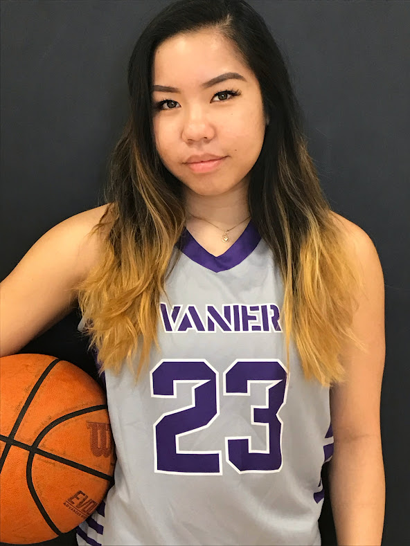 Jan wearing a Vanier jersey